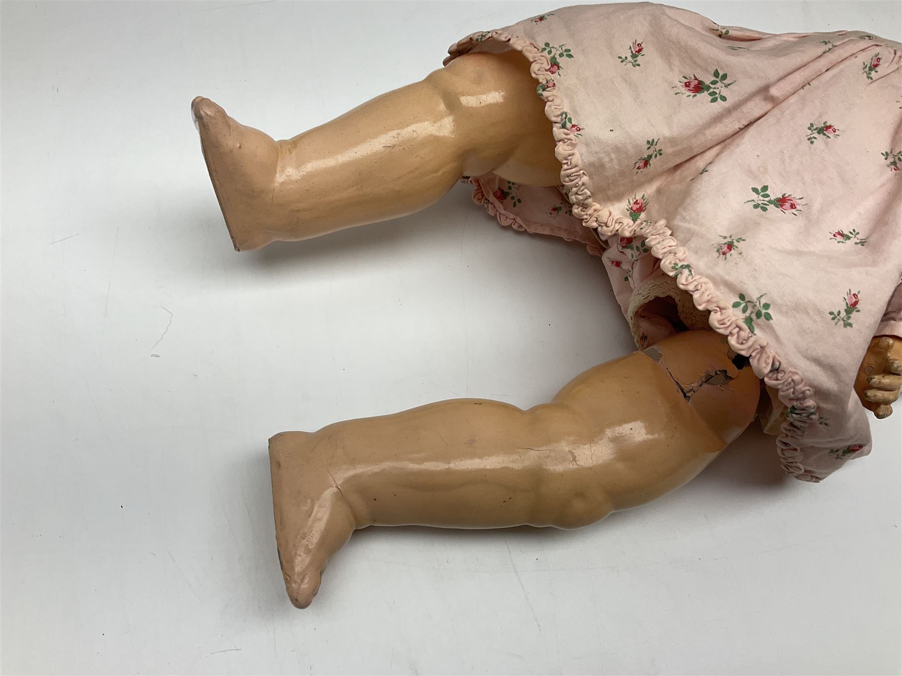 Armand Marseille Koppelsdorf composition head doll with applied hair, sleeping eyes, open mouth with teeth and tongue and composition body with jointed limbs, marked 'AM Koppelsdorf 970 Germany A.7.M' H55cm; Armand Marseille bisque head doll with applied hair, open mouth with teeth and composition body with jointed limbs, marked 'Armand Marseille 390n DRGM 246/1 A3/0M'; Fleur de Genet costume doll; and quantity of 1930s doll's house furniture