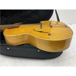 1950s acoustic guitar with f-holes and pickguard L105cm; black fur lined hard carrying case