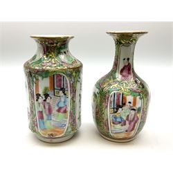 Two late 19th/early 20th century Chinese famille rose vases, the first example of cylindrical form with waisted neck, the second of ovoid form with waisted neck and flared rim, each decorated with panels of figures and birds, each approximately H13cm. 