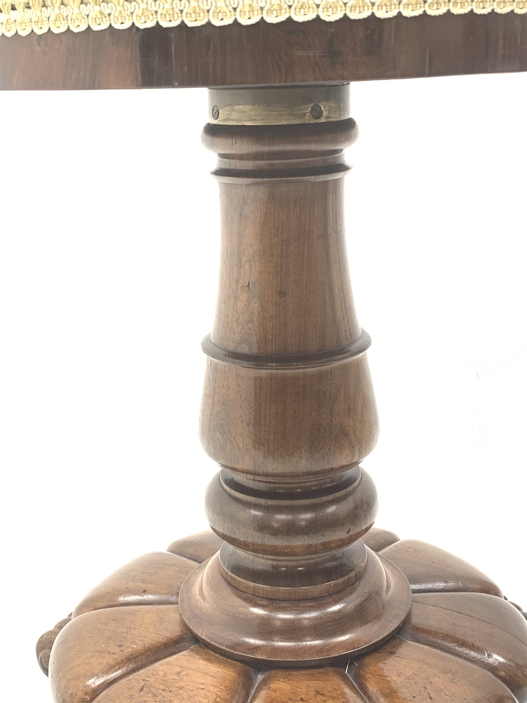 Victorian rosewood adjustable piano stool, circular revolving upholstered seat on turned column support, lobe carved platform base, three scroll carved feet, H53cm (lowest height)