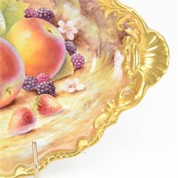 Late 20th century Royal Worcester dish, of oval form with gilt shaped rim and twin shell handles, hand painted by Jason Bowman with still life of fruit upon mossy ground, signed J Bowman, wit marks beneath, with makers fitted card box


