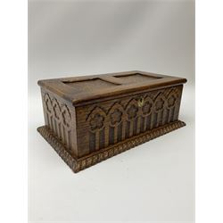 An oak keep box, with carved decoration to front and sides, H15cm L39cm D23.5cm.
