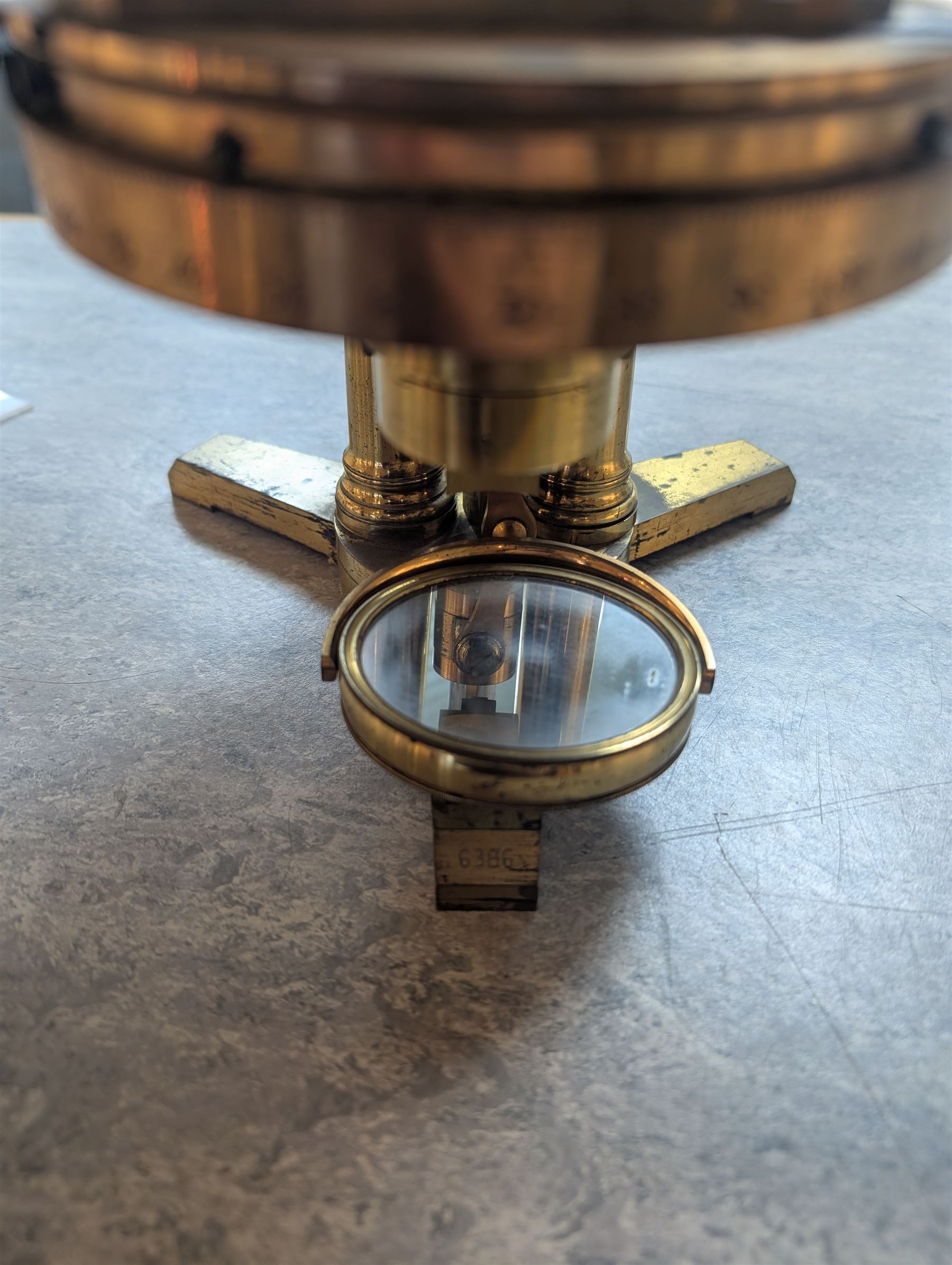 19th century brass binocular microscope by R&J Beck, 31 Cornhill London, numbered 6386, with rack and pinion focusing, housed in wooden case with case of accessories, including eyepieces, objective lenses and condenser