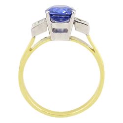 18ct gold tanzanite and diamond ring, single stone oval cut tanzanite of approx 1.75 carat, with two baguette cut diamonds set either side, stamped 750