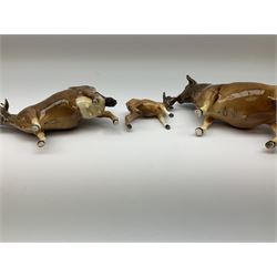 Beswick Jersey family group, comprising bull Dunsley Coy Boy model no 1422, cow Newton Tinkle model no 1345, and calf model no 1249d.