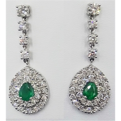 Pair of 18ct white gold pear drop emerald and diamond cluster drop ear-rings hallmarked, emeralds 1.7 carat, diamonds 3.25 carat  