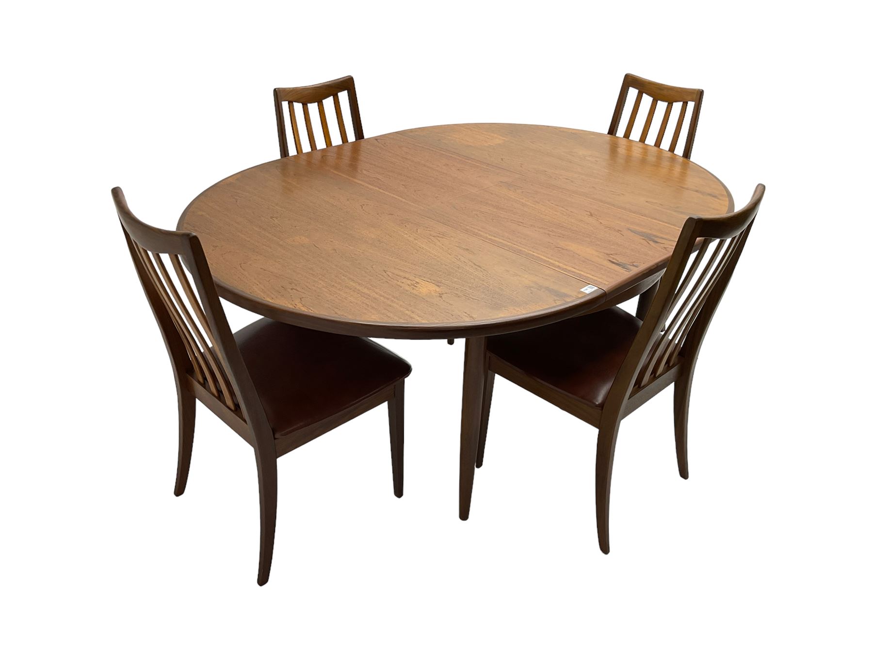 G-Plan - mid-20th century teak 'Fresco' extending dining table, circular top on tapered supports (W122cm H74cm); and Leslie Dandy for G-Plan - set six mid-20th century teak 'Fresco' dining chairs, high backs over tan leatherette seats (W46cm H91cm)
