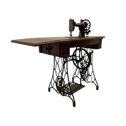 Singer - walnut and cast iron treadle sewing machine