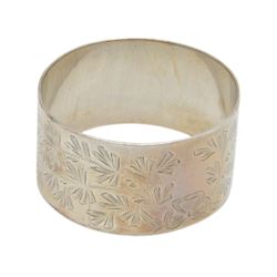 Set of six 1930s commemorative coronation teaspoons, each depicting a different monarch with their coronation date, hallmarked Josiah Williams & Co,  London 1936, in fitted case, together with a silver napkin ring with personal engraving, hallmarked Walker & Hall, Sheffield 1894, in fitted case