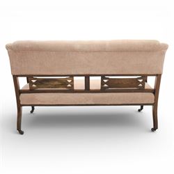 Quality Edwardian seven piece inlaid salon suite, comprising three seater settee, pair of arm chairs and four chairs with pierced splat backs, upholstered in pale pink fabric, inlaid with flowering urns, upon tapering legs with spade feet and castors