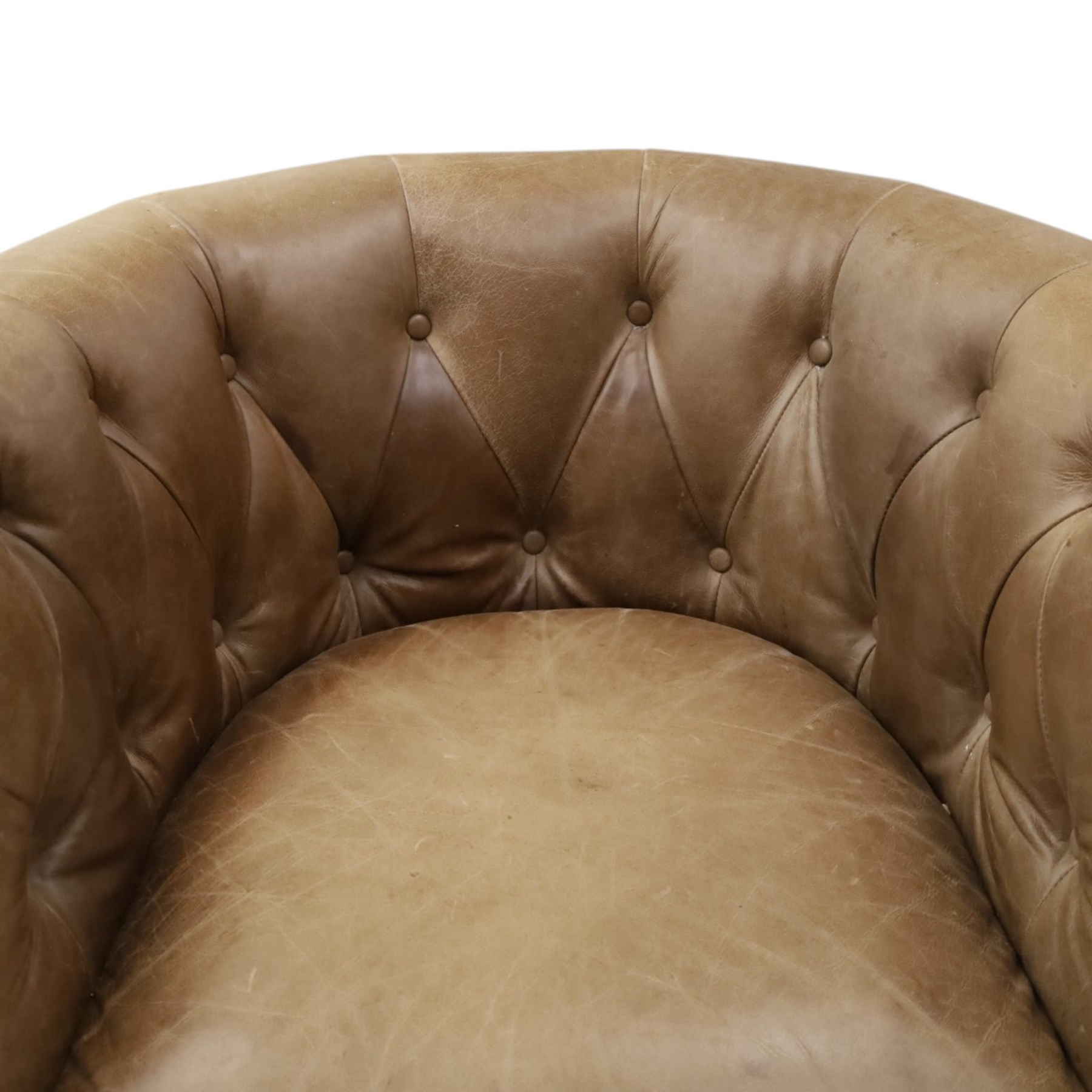 Alexander and James - pair of 'Jude' tub armchairs, traditional tub shape with buttoned back over deep seat, with studwork to the arm terminals, raised on turned front supports and splayed rear supports