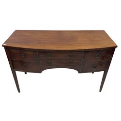 19th century mahogany bow front sideboard, fitted with five drawers, the right-hand double high cellarette drawer with lead lining, raised on square tapering supports with geometric ebony stringing