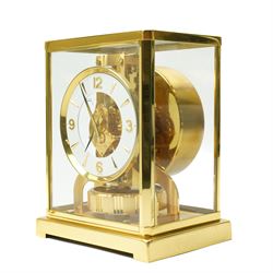 Jaeger- LeCoultre Atmos clock No.291241, with white dial in brass and five glass case and outer carrying case with instruction booklet and original receipt dated 1970 H22cm