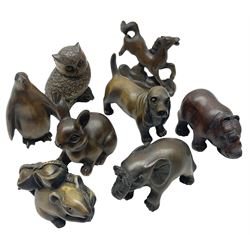 Eight netsuke, modelled as a rabbit, rat, elephant, rhino, dog, owl, penguin and horse