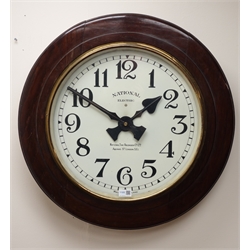  Large National Electric wall clock, circular white Arabic dial with brass bezel, in moulded mahogany surround, D68cm  