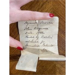 Sevres dejeuner 'Bleu turquoise' tea service for six covers, decorated by Charles-Eloi Asselin, comprising six teacups and saucers, teapot, milk jug and covered sucrier, the bleu de ciel ground painted with portraits of the French courtiers, each piece with name to base (some rubbed) of those depicted, to include Marie Antoinette (teapot), Madame de Montesson, Madame du Barry, Madam de Genlis, Madame Elizabeth (sucrier), Madame de Lamballe (milk jug) Madame Victoire, and two others unidentified, within finely painted gilt surround, each portrait encircled by red jewelled borders, the saucers with corresponding monograms within similar floral gilt and jewelled borders, Sevres mark to base with painted 'ee', dating these 1782, teapot H14cm 