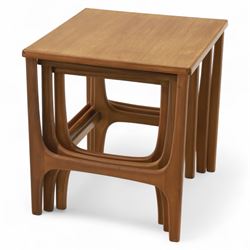 Mid-century modern teak nest of tables, comprising three graduating rectangular tables wit...