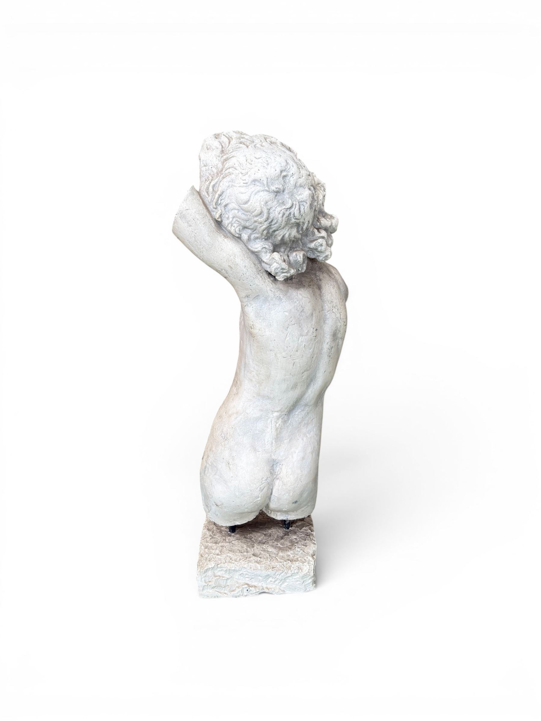 Early 20th century sculptured painted plaster figure of a boys torso, raised on 'stone' plinth