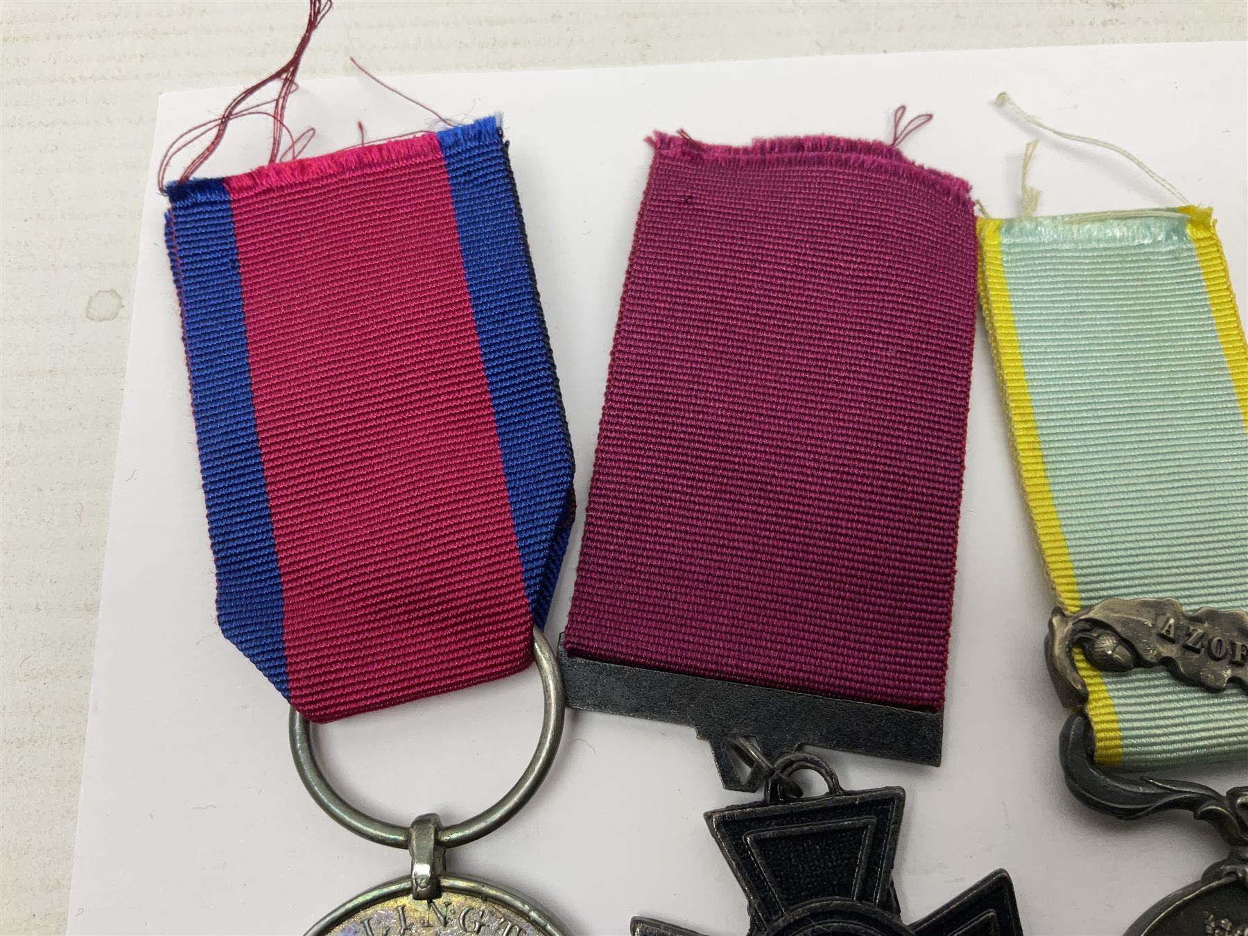 Seven copies of early medals - Waterloo, Crimea, Mediterranean, China 1900, Victoria Cross, Natal Rebellion and Tibet 1903-4; all with ribbons (7)