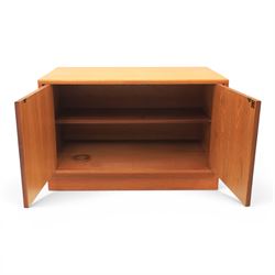 G Plan - Mid 20th century teak units, comprising tall shelving unit with cupboard sections, fall front and open shelves, together with a low twin-door cupboard unit, on plinth bases

Low unit: H 53cm, D 46cm, W 81cm
Tall unit: H 199cm, D 46cm, W 76cm