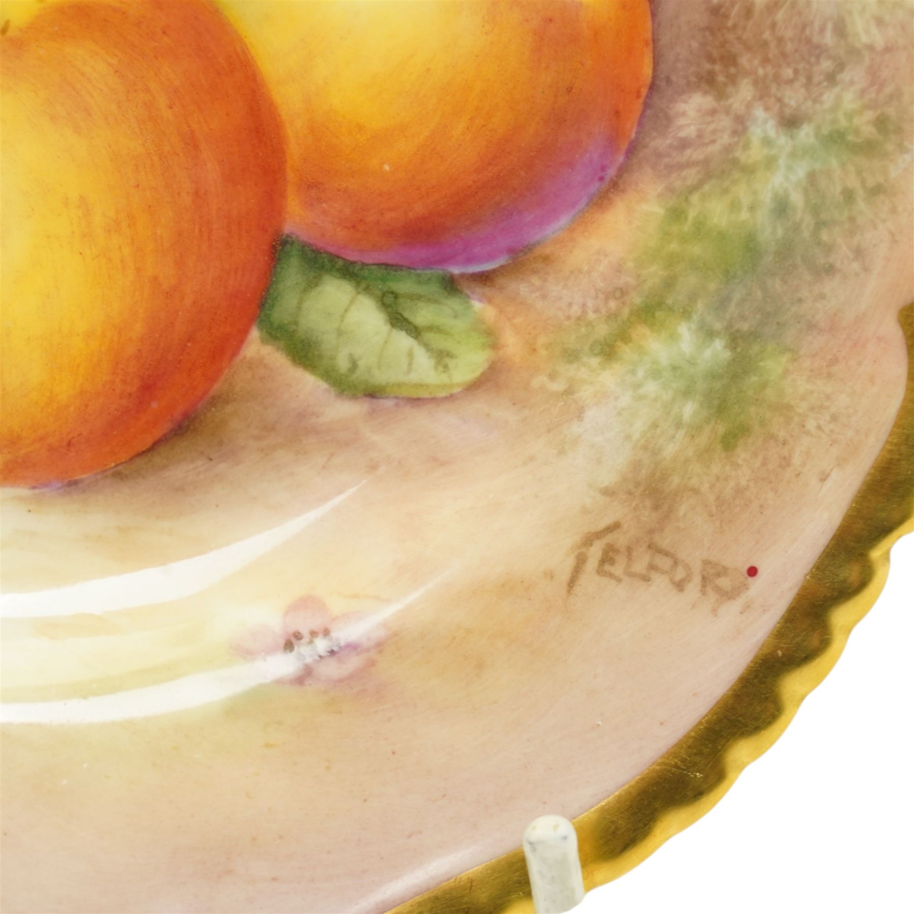 Royal Worcester porcelain cabinet plate by Alan Telford painted with apples and blackberries on a mossy bank within a gadrooned gilt border, signed Telford D15cm