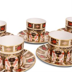 Eight Royal Crown Derby Old Imari 1128 pattern coffee cans and saucers