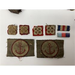 WW2 German Luftwaffe Mess cutlery comprising table spoon and fork, each with H.M.Z.38 mark; WW1 British War Medal awarded to L-13858 Gnr. J. McCabe R.A.; and small quantity of military badges, rank pips etc