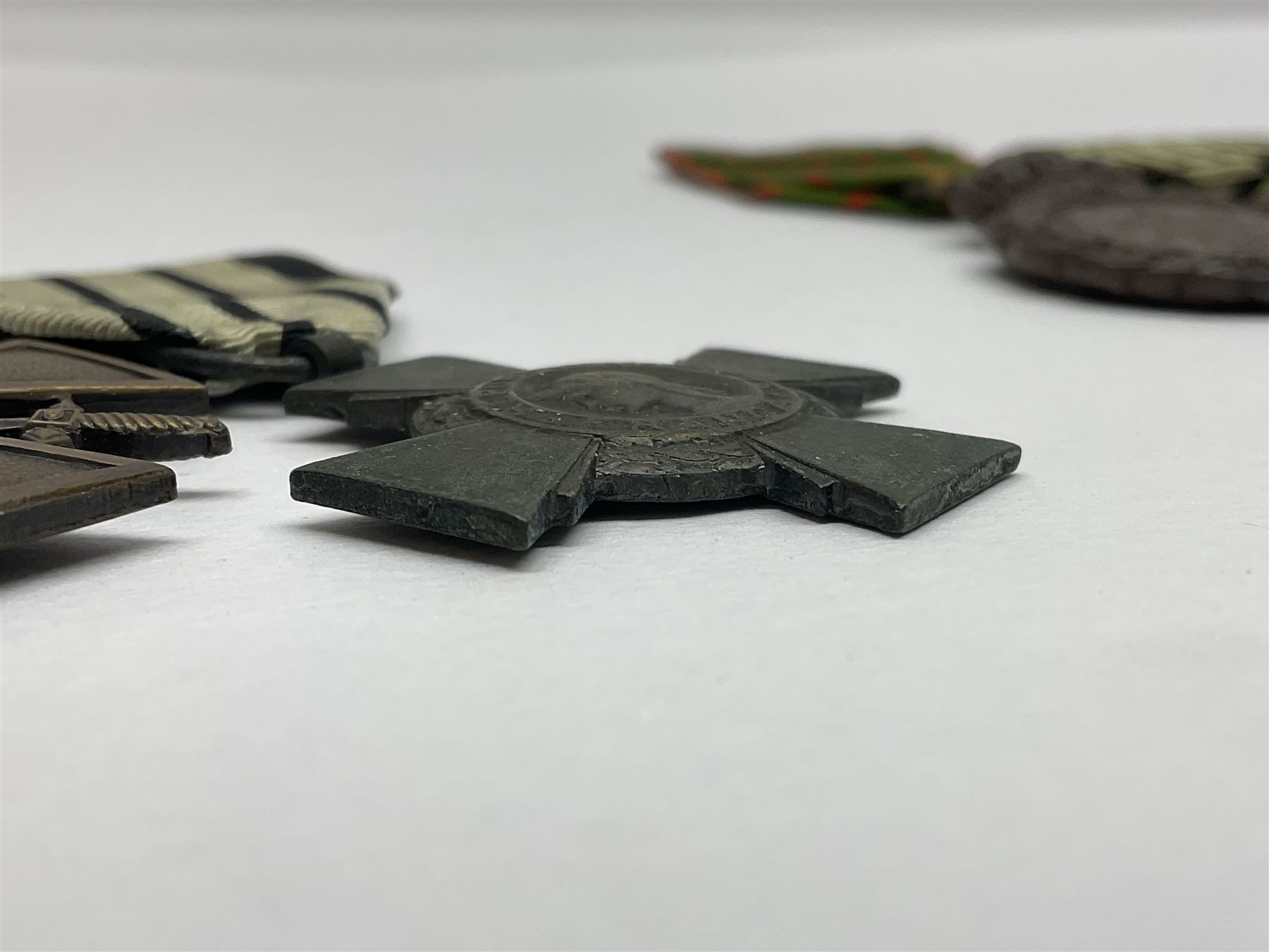 Four French medals - St. Helena medal with bust of Napoleon to obverse and inscription to reverse 'Campagnes de 1792 a 1815. A ses compagnons de gloire sa derniere pensée Ste. Hélène 5 Mai 1821', established by Emperor Napoleon III in 1857; two WW2 Croix-de-Guerre; and WW2 Croix-du-Combattant; all with ribbons (4)