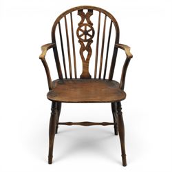 Late 19th century elm and ash low-back Windsor chair, swept arms raised on turned supports  united by H-stretcher