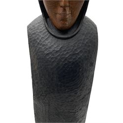 John Bunting FRBS, FRCA (1927-2002): Carved sculpture of a standing Monk in ebonised robes