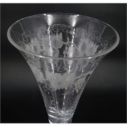 Large 19th century wine glass, the drawn trumpet bowl engraved with fruiting vine, upon single series mercury twist stem and conical foot, H25cm 