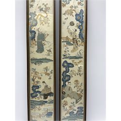 A pair of Japanese silk work panels, depicting figures within a landscape with blossoming trees, fences and rivers, including frame H57.5cm L10.5cm.