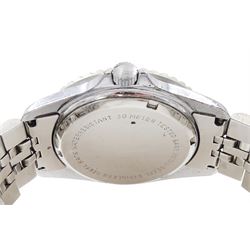 Heuer Professional gentleman's stainless steel quartz wristwatch, Ref. 980.043, black dial with luminous Arabic hour markers and date aperture, on stainless steel bracelet, with fold-over clasp