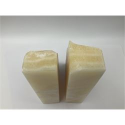 Pair of honey onyx bookends of rectangular form with polished to three sides with a raw outer edge, H18cm 