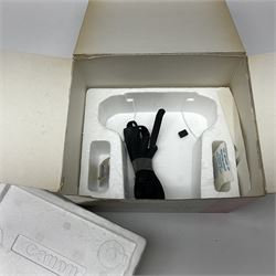 Canon FTb camera body, serial no. 715838, with 'Canon FD 50mm 1:1.8' lens, serial no. 207888, in original box, together with Canon FTb camera body, serial no. 557817, with 'Canon FD 35mm 1:3.5 S.C' lens, serial no. 126210 and Canon EX Auto camera body, serial no. 296244 with 'Canon EX 50mm 1:1.8' lens, serial no. 380869  