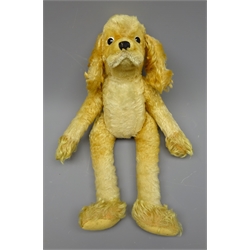  Steiff plush covered five joint long legged Spaniel, with applied plastic eyes and stitched nose H38cm  