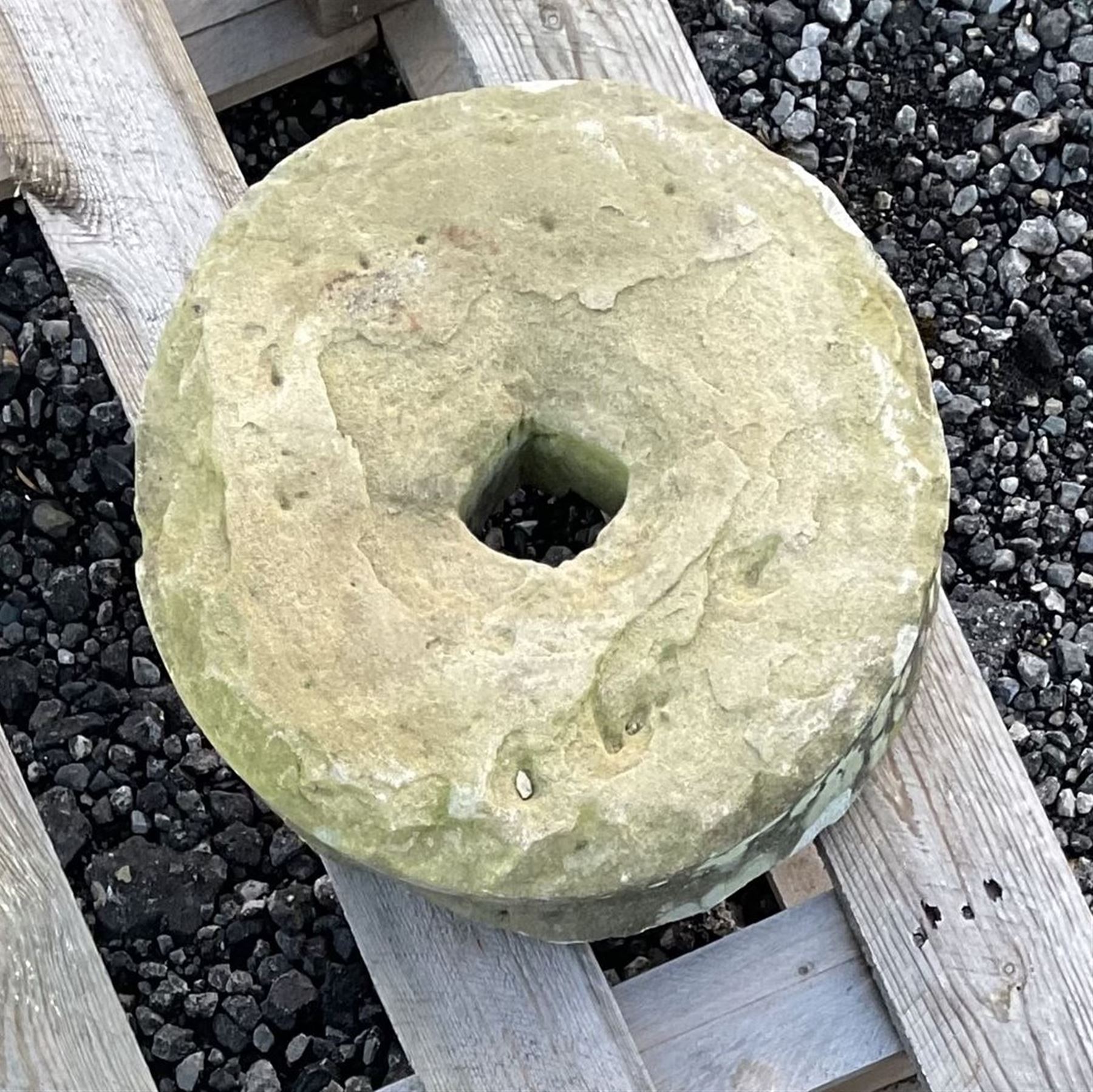 Small 19th century stone mill wheels