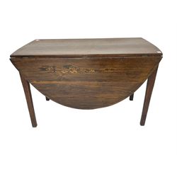 Oak drop leaf dining table, oval top raised on square tapering supports