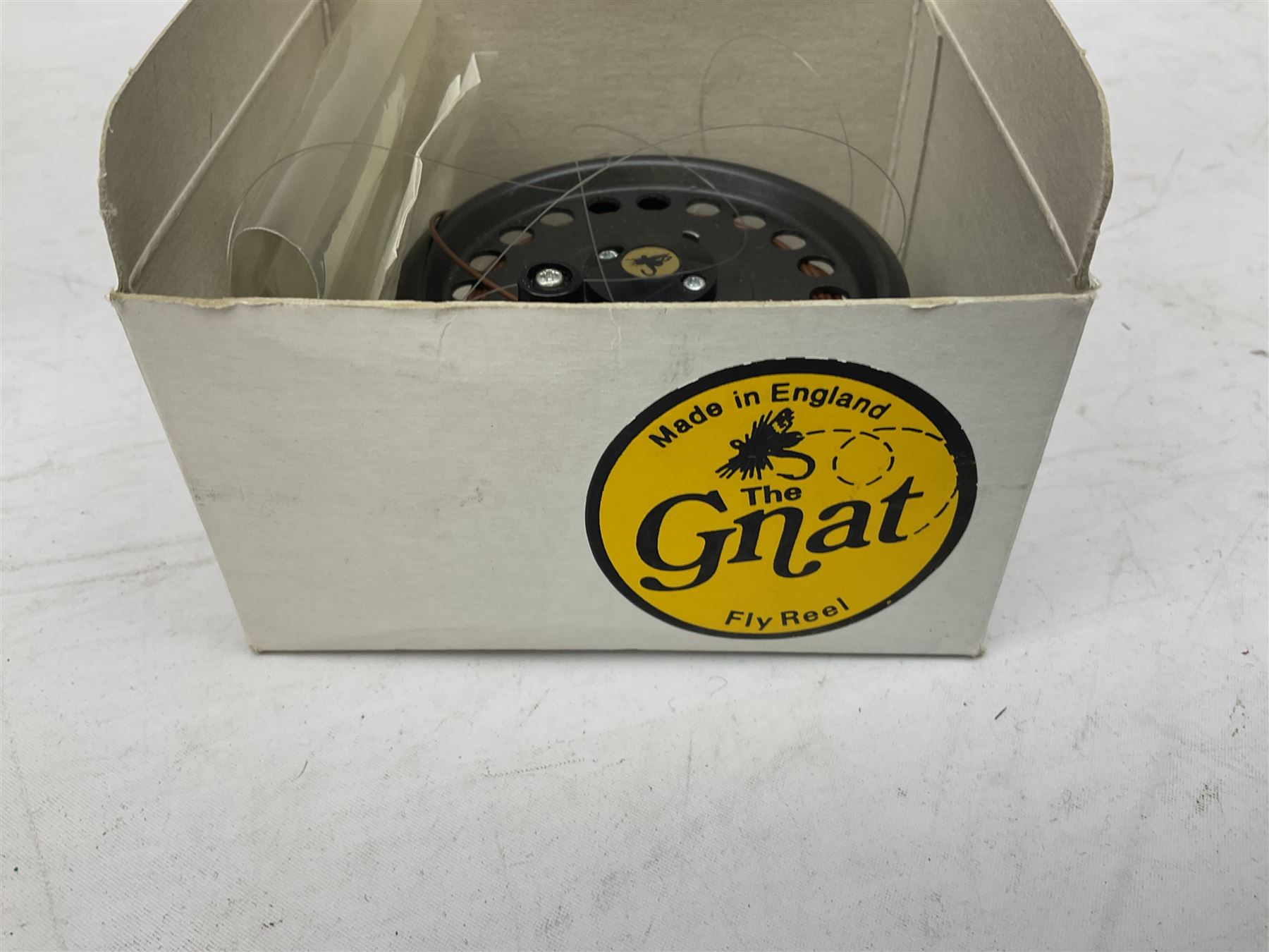 Fishing tackle, including 'The Gnat' fly reel, Alvey 4 1/2 inch reel, Paramount 4 1/2 inch reel, other fishing reels, various fishing flies and other similar items in a carry bag 