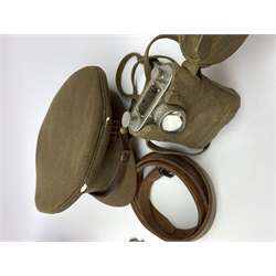 Scots Guards - two officer's peaked caps with chin strap and side buttons, one with badge, and blue dress peaked cap marked HEB for Harold Ellett-Brown; two Artist Rifles and one West Yorkshire cap badges and two Scots Guards shoulder flashes; officer's brown leather Sam Brown belt with shoulder brace strap and revolver holster; officer's Orilux trench torch etc