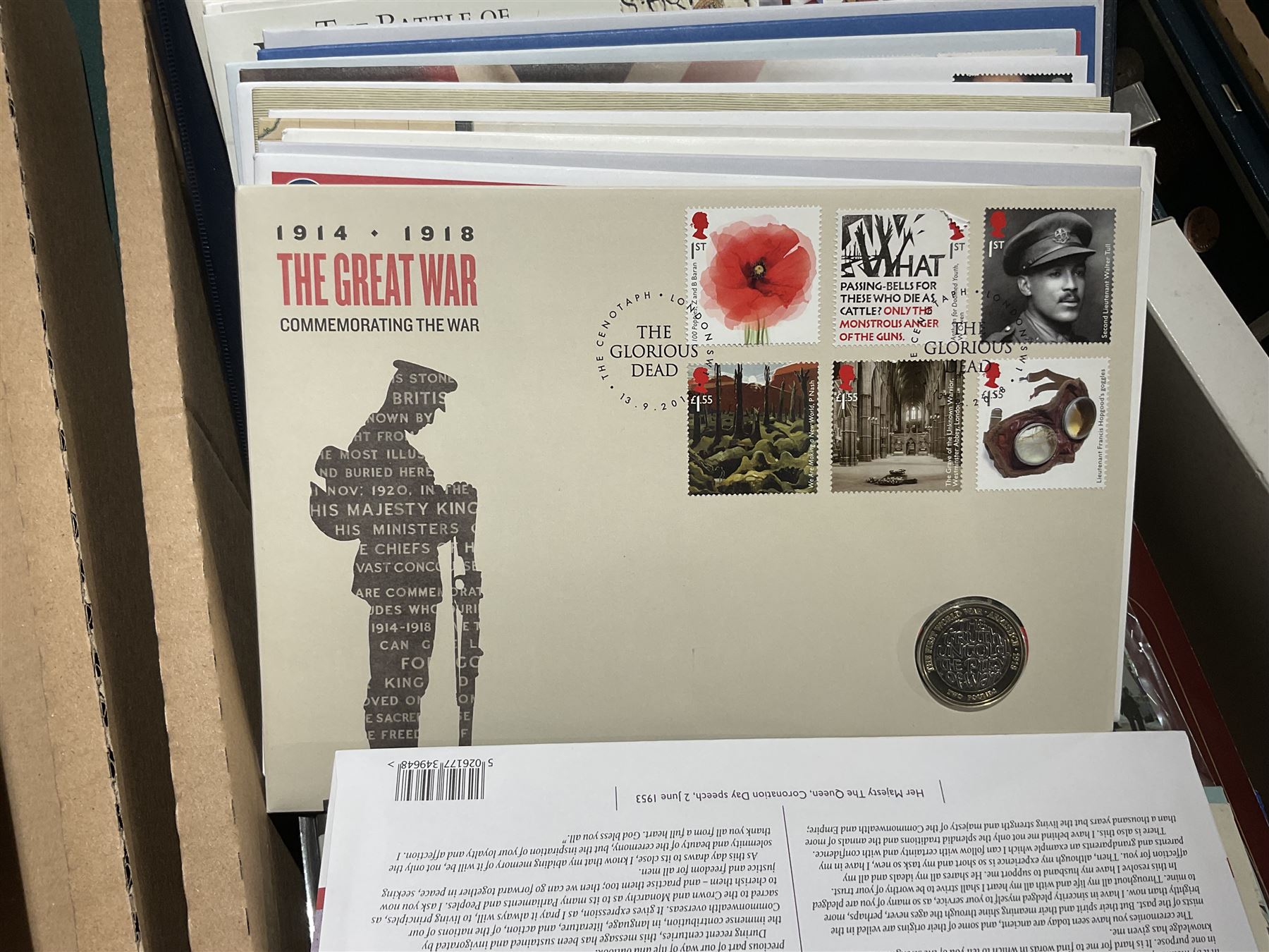 Approximately one hundred and fifteen Royal Mint coin covers, in two ring binder folders and loose, together with approximately 53 grams of Great British pre-1920 and approximately 68 grams of Great British pre-1947 silver threepence coins, and a small quantity of further pre-decimal coins