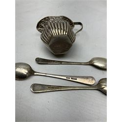 Set of three silver teaspoons, hallmarked Pinder Brothers, Sheffield 1946, together with late 19th century jug with repousse foliate decoration, hallmarked Lines, Bunn & Mason, Birmingham 1898, and pair of cut glass vases with silver collars, total weighable silver weight approx 108g