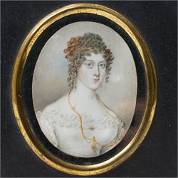 19th century miniature half length portrait on ivory of a lady wearing a gold locket, ebonised frame 13.5cm x 11.5cm