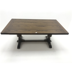  Old Charm oak drawer leaf dining table, carved cup and cover supports on shaped sledge feet joined by single stretcher (W275cm extended, 183cm closed, H76cm, D108cm) and set eight (6+2)  chairs, arched cresting rail with finials, studded leather back and seat, cup and cover supports joined by stretchers (W  