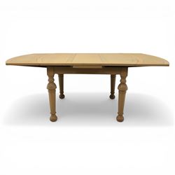 Edwardian light oak extending dining table, oval-ended rectangular top with panelled decoration and double line borders, draw-leaf extension action to 211cm long, on turned supports