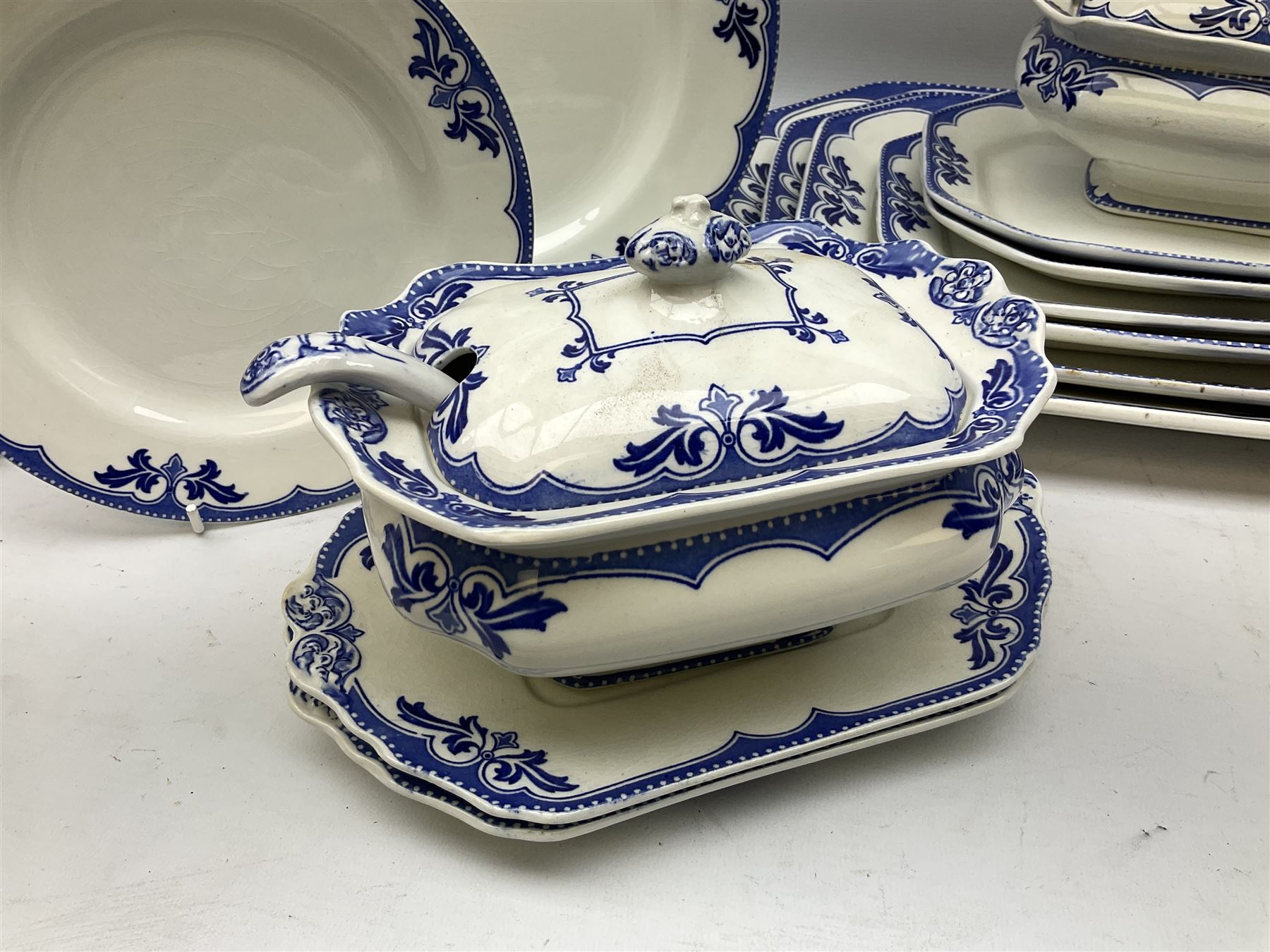 Burgess and Leigh Middleport pottery dinner wares decorated in the ‘Milford’ pattern, to include lidded tureens, graduated meat plates, dinner plates etc 