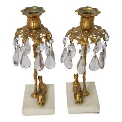 Pair 19th century gilt candle lustres, with recumbent grey hounds, below a leaf stem with flower bud sconce, H25cm