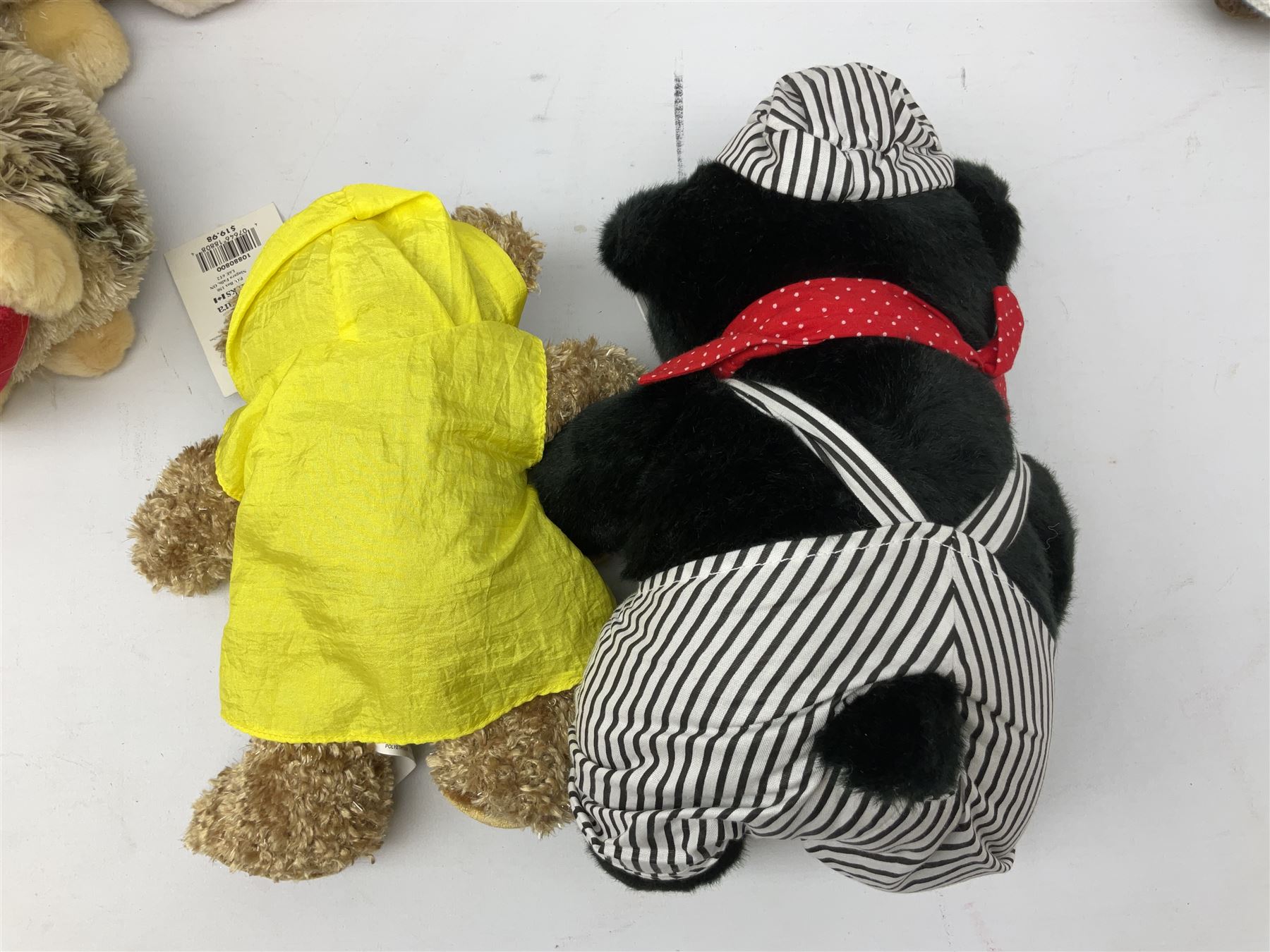 Ten soft tots including Chad Valley Lenny the Lion; Snoopy type dog; Fluffy Hedgehogs; pink Care Bear; souvenir bears for Niagara Falls, Benjamin Franklin and Andre Rieu; Rocky Mountaineer Traindriver; knitted Mrs. Tiggy-Winkle etc; all unboxed (10)