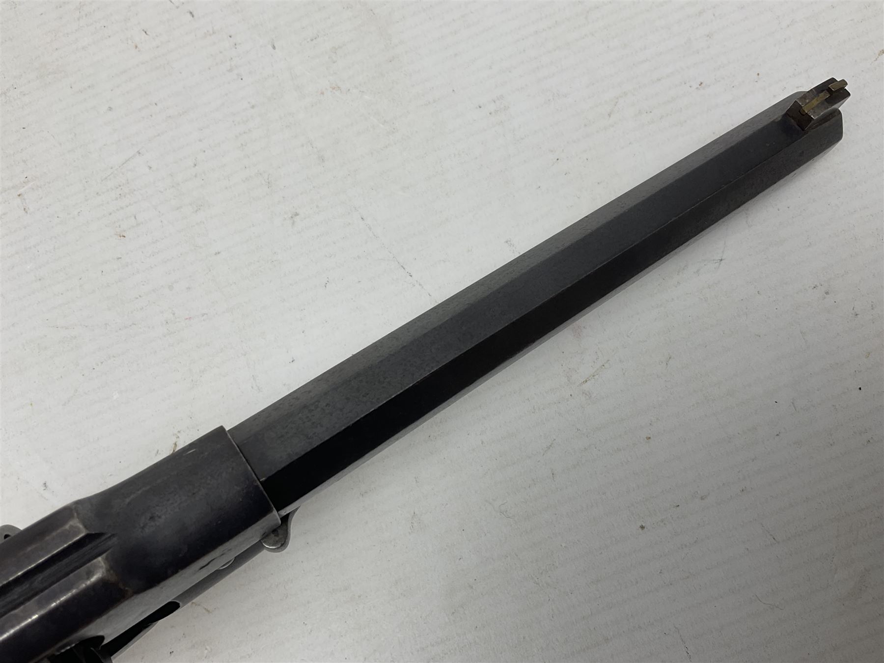 Unmarked Spencer & Rogers type Remington style .44 cal. six-shot percussion revolver, 20cm octagonal barrel with loading lever under, brass trigger guard and two-piece wooden grip L37cm overall; together with a framed watercolour by Alan J. Gray dated 2009 entitled 'The Remington .44 Calibre 1861 Navy Revolver'  19 x 42cm (2)