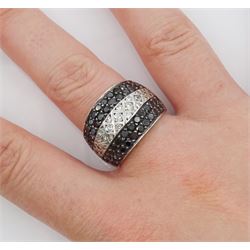 White gold round brilliant cut black and white diamond ring